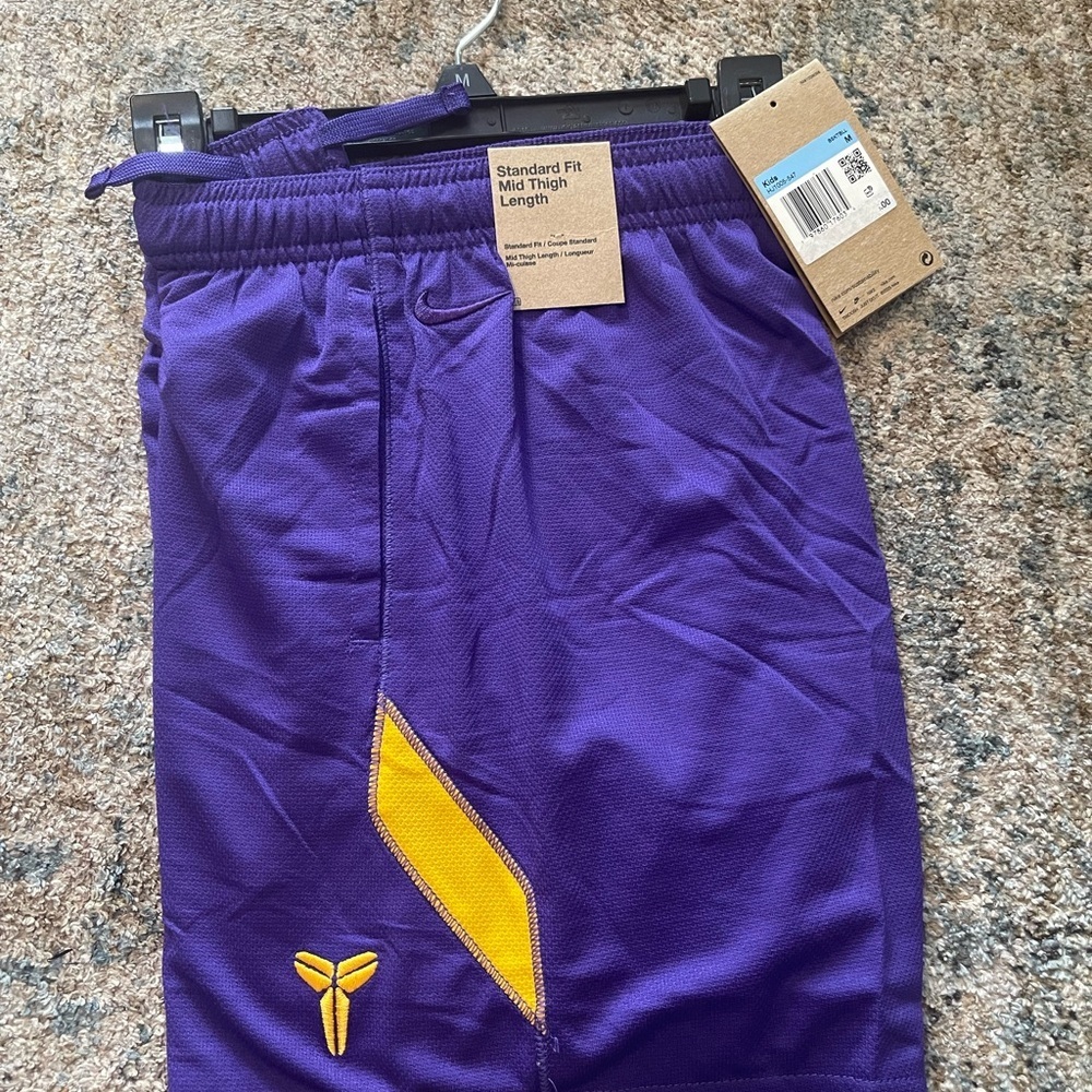 Nike Purple Basketball Shorts with Yellow Accent